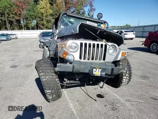 2001 Jeep Wrangler SE with VIN 1J4FA29P71P310653, listed as a Copart auction lot 81682424 with 0 mi miles and Salvage Title. Bid and sale history available at carsss.com. Image 11.