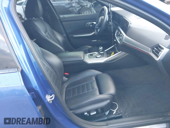 2020 BMW 3 Series M340i xDrive with VIN WBA5U9C00LFH03223, listed as a IAAI auction lot 41020498 with 58,775 mi miles and . Bid and sale history available at DreamBid. Image 5.