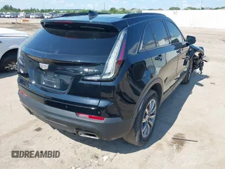 2019 Cadillac XT4 FWD Sport with VIN 1GYFZER46KF125100, listed as a IAAI auction lot 42221290 with 79,491 mi miles and . Bid and sale history available at DreamBid. Image 4.