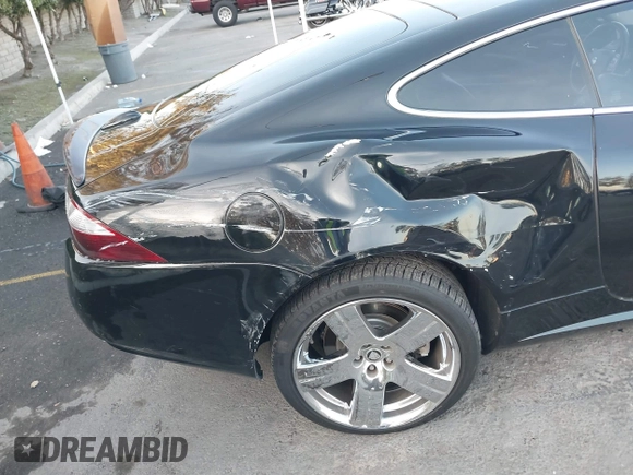 2008 Jaguar XK with VIN SAJWA43B985B23987, listed as a IAAI auction lot 41197091 with 54,803 mi miles. Bid and sale history available at carsss.com. Image 6.