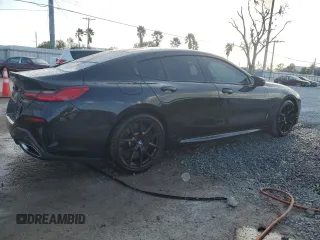 2023 BMW 8 Series M850i with VIN WBAGV8C02PCK67527, listed as a Copart auction lot 80470154 with 17,873 mi miles and Salvage Title. Bid and sale history available at carsss.com. Image 3.