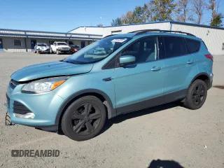 2013 Ford Escape SE with VIN 1FMCU0GXXDUA90806, listed as a Copart auction lot 72814224 with 136,543 mi miles and Salvage title. Bid and sale history available at DreamBid. Image 1.