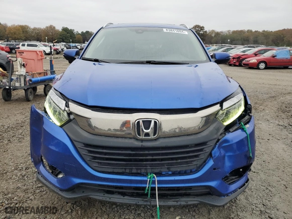 2021 Honda HR-V EX-L with VIN 3CZRU5H77MM701836, listed as a Copart auction lot 83841894 with 77,801 mi miles and Salvage Title. Bid and sale history available at carsss.com. Image 5.