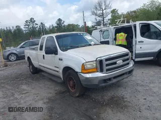 1999 Ford Super Duty F-250 XL with VIN 1FTNX20F0XED78124, listed as a IAAI auction lot 41938013 with 249,999 mi miles. Bid and sale history available at carsss.com. Image 1.