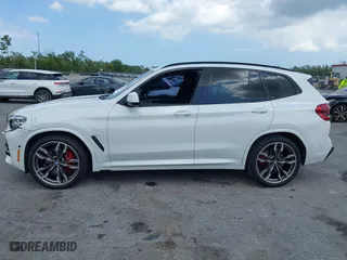 2021 BMW X3 M40i with VIN 5UXTY9C04M9G46876, listed as a IAAI auction lot 41965573 with 112,893 mi miles. Bid and sale history available at carsss.com. Image 14.