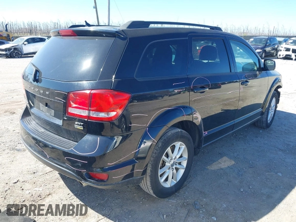2016 Dodge Journey SXT with VIN 3C4PDCBGXGT123087, listed as a IAAI auction lot 41869667 with 256,583 mi miles. Bid and sale history available at carsss.com. Image 4.