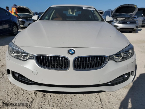 2014 BMW 4 Series 435i xDrive with VIN WBA3R5C5XEK187991, listed as a Copart auction lot 77209064 with 0 mi miles and Salvage Title. Bid and sale history available at carsss.com. Image 5.