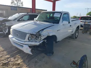 2003 Ford Ranger XL with VIN 1FTYR10U53PB75860, listed as a IAAI auction lot 41953686 with 129,082 mi miles. Bid and sale history available at carsss.com. Image 2.