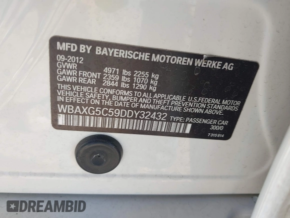 2013 BMW 5 Series 528i with VIN WBAXG5C59DDY32432, listed as a IAAI auction lot 41230673 with 103,069 mi miles and . Bid and sale history available at carsss.com. Image 9.