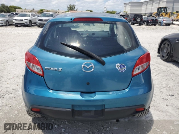 2011 Mazda 2 Sport with VIN JM1DE1HY0B0122590, listed as a Copart auction lot 56162515 with 140,847 mi miles and Clean Title. Bid and sale history available at DreamBid. Image 6.