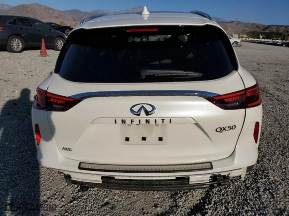 2019 Infiniti QX50 LUXE with VIN 3PCAJ5M31KF148164, listed as a Copart auction lot 86011934 with 69,841 mi miles and Salvage Title. Bid and sale history available at carsss.com. Image 6.