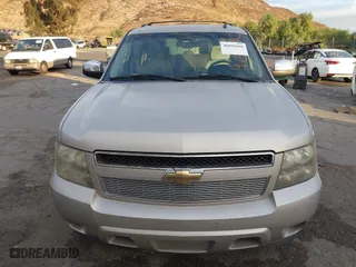 2007 Chevrolet Suburban LT with VIN 1GNFC16007R231427, listed as a IAAI auction lot 40995668 with 168,691 mi miles. Bid and sale history available at carsss.com. Image 6.
