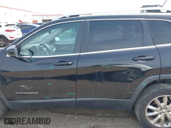2014 Jeep Cherokee Limited with VIN 1C4PJLDB4EW256137, listed as a IAAI auction lot 42236043 with 145,517 mi miles and . Bid and sale history available at DreamBid. Image 15.