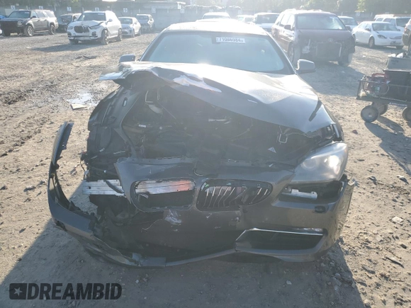 2014 BMW 6 Series 640i z VIN WBA6A0C58EDZ04545, wystawiony jako Copart lot #71086984 z przebiegiem 99 048 mil mil oraz Szkoda całkowita • Salvage title. Historia ofert i sprzedaży dostępna na DreamBid. Obrazek 5.