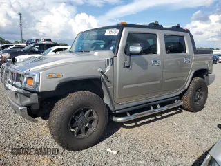 2005 Hummer H2 SUT with VIN 5GRGN22U85H110412, listed as a Copart auction lot 73856704 with 262,954 mi miles and Salvage Title. Bid and sale history available at carsss.com. Image 1.