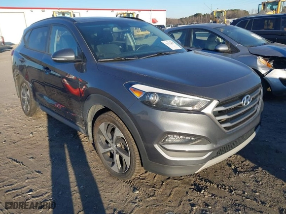 2018 Hyundai Tucson Value with VIN KM8J3CA2XJU776526, listed as a IAAI auction lot 41322657 with 102,444 mi miles. Bid and sale history available at carsss.com. Image 1.