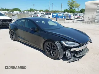 2021 Tesla Model S Plaid with VIN 5YJSA1E66MF452258, listed as a IAAI auction lot 41832000 with 42,845 mi miles. Bid and sale history available at carsss.com. Image 1.