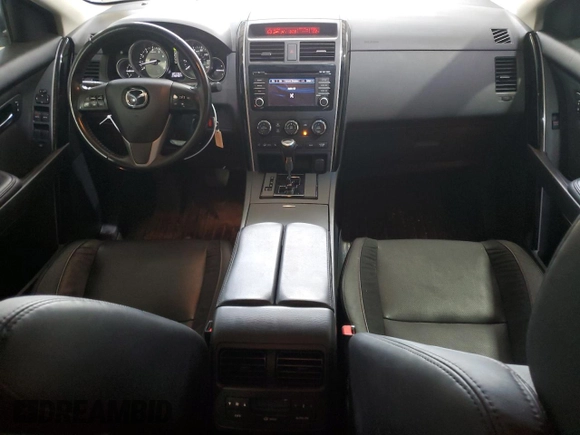 2015 Mazda CX-9 Touring with VIN JM3TB3CV4F0453294, listed as a Copart auction lot 57066405 with 119,046 mi miles and Salvage title. Bid and sale history available at DreamBid. Image 8.