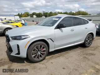2025 BMW X6 M60i with VIN 5UX43EX06S9W68023, listed as a Copart auction lot 69874764 with 3,789 mi miles and Salvage Title. Bid and sale history available at carsss.com. Image 1.