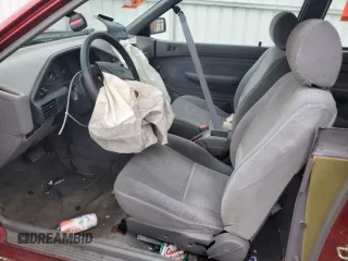 1996 Ford Escort z VIN 3FASP11J6TR151727, wystawiony jako Copart lot #55487725 z przebiegiem 118 276 mil mil oraz Nie do naprawy. Historia ofert i sprzedaży dostępna na DreamBid. Obrazek 7.