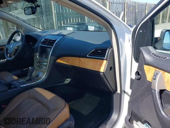 2013 Lincoln MKX with VIN 2LMDJ8JK7DBL13659, listed as a IAAI auction lot 41922667 with 113,858 mi miles. Bid and sale history available at carsss.com. Image 4.