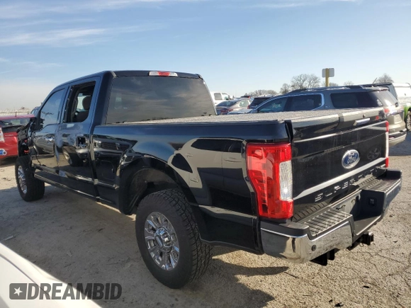 2017 Ford F-250 XL with VIN 1FT7W2A67HED56391, listed as a Copart auction lot 49100395 with 76,050 mi miles and Salvage title. Bid and sale history available at DreamBid. Image 2.