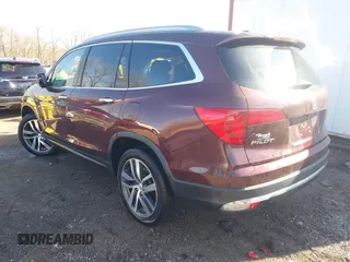 2016 Honda Pilot Touring with VIN 5FNYF6H90GB126572, listed as a IAAI auction lot 41872113 with 94,318 mi miles. Bid and sale history available at carsss.com. Image 3.