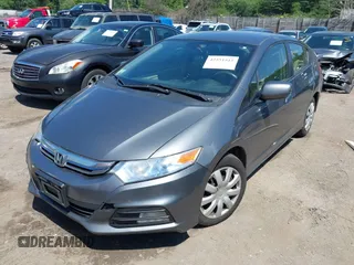 2013 Honda Insight with VIN JHMZE2H31DS002352, listed as a IAAI auction lot 42551515 with 148,393 mi miles and . Bid and sale history available at DreamBid. Image 2.
