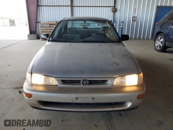 1997 Toyota Corolla with VIN 1NXBA02E4VZ577026, listed as a Copart auction lot 66184515 with 201,324 mi miles and Clean title. Bid and sale history available at DreamBid. Image 5.