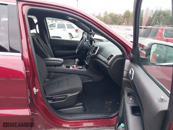 2019 Jeep Grand Cherokee Laredo E with VIN 1C4RJFAG2KC814154, listed as a IAAI auction lot 38877814 with 54,119 mi miles. Bid and sale history available at carsss.com. Image 5.