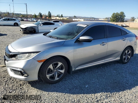 2020 Honda Civic LX with VIN 19XFC2F6XLE205068, listed as a Copart auction lot 46477215 with 58,296 mi miles and Salvage Title. Bid and sale history available at DreamBid. Image 1.