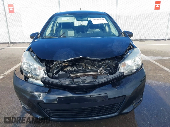 2014 Toyota Yaris L with VIN JTDKTUD36ED586456, listed as a IAAI auction lot 41888730 with 92,742 mi miles. Bid and sale history available at carsss.com. Image 12.