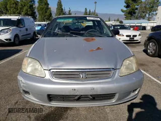 1999 Honda Civic LX with VIN 2HGEJ6571XH552867, listed as a Copart auction lot 81715654 with 234,544 mi miles and Salvage Title. Bid and sale history available at DreamBid. Image 5.