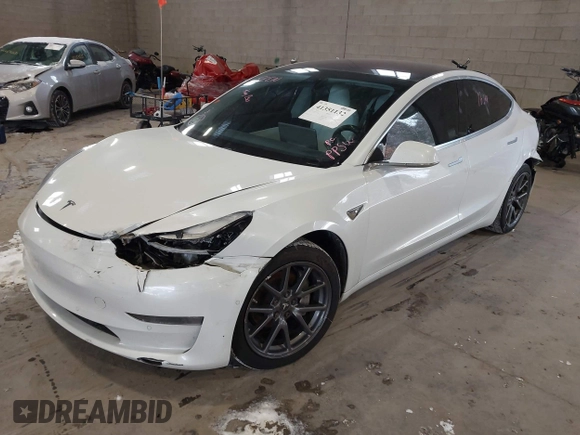 2020 Tesla Model 3 Long Range z VIN 5YJ3E1EB9LF622214, wystawiony jako IAAI lot #41351132 z przebiegiem 133 805 mil mil oraz . Historia ofert i sprzedaży dostępna na DreamBid. Obrazek 2.