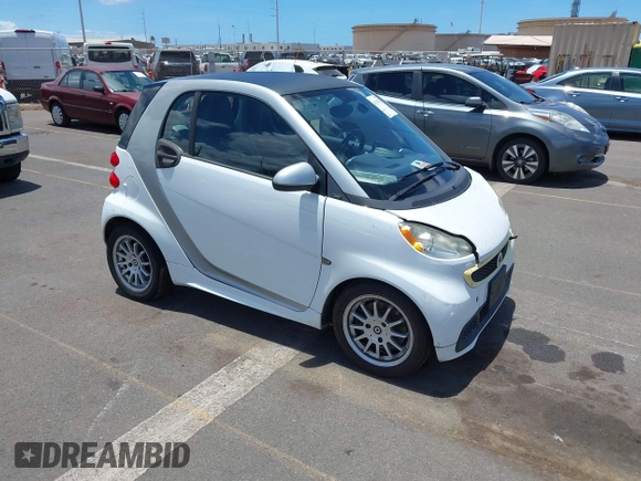 2013 Smart fortwo Pure with VIN WMEEJ3BA8DK605597, listed as a IAAI auction lot 42395754 with 55,637 mi miles and . Bid and sale history available at DreamBid. Image 1.