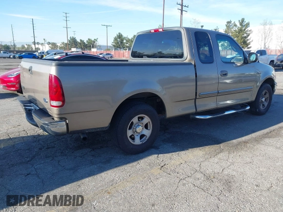 2002 Ford F-150 XL with VIN 1FTRX17232NA79508, listed as a IAAI auction lot 41870844 with 111,429 mi miles. Bid and sale history available at carsss.com. Image 4.