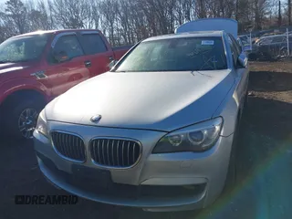 2014 BMW 7 Series 740i with VIN WBAYA6C54ED144450, listed as a IAAI auction lot 41680060 with 999,999 mi miles. Bid and sale history available at carsss.com. Image 11.