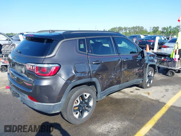 2018 Jeep Compass Trailhawk with VIN 3C4NJDDB3JT231923, listed as a IAAI auction lot 41929198 with 129,001 mi miles and . Bid and sale history available at carsss.com. Image 4.