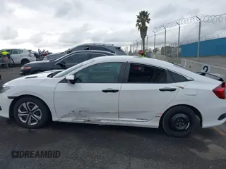 2016 Honda Civic Sedan LX with VIN 2HGFC2F54GH564676, listed as a IAAI auction lot 41784352 with 107,939 mi miles. Bid and sale history available at carsss.com. Image 15.