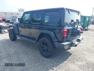 2020 Jeep Wrangler Unlimited Sahara High Altitude with VIN 1C4HJXEGXLW182581, listed as a IAAI auction lot 42612084 with 52,656 mi miles and . Bid and sale history available at DreamBid. Image 3.