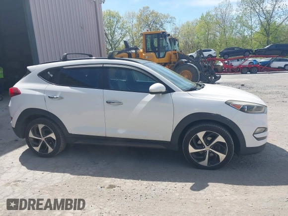 2016 Hyundai Tucson Eco with VIN KM8J3CA22GU076489, listed as a IAAI auction lot 42169732 with 153,597 mi miles. Bid and sale history available at carsss.com. Image 13.