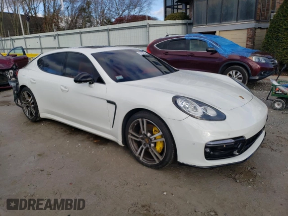 2014 Porsche Panamera z VIN WP0AA2A74EL010108, wystawiony jako Copart lot #85194254 z przebiegiem 77 568 mil mil oraz Czysty tytuł • Clean title. Historia ofert i sprzedaży dostępna na DreamBid. Obrazek 4.