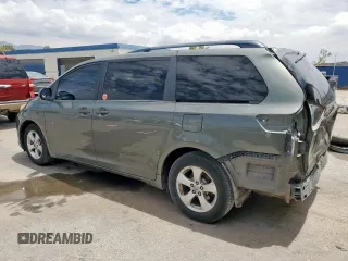 2014 Toyota Sienna LE AAS with VIN 5TDKK3DC4ES486440, listed as a Copart auction lot 62010355 with 401,453 mi miles and Salvage title. Bid and sale history available at DreamBid. Image 2.