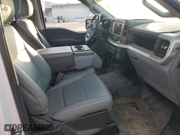 2023 Ford F-150 XL with VIN 1FTMF1C59PKE40505, listed as a Copart auction lot 87022404 with Not Provided miles and Salvage Title. Bid and sale history available at carsss.com. Image 10.
