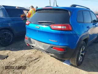 2018 Jeep Cherokee Trailhawk with VIN 1C4PJMBB2JD569069, listed as a IAAI auction lot 41651023 with 80,201 mi miles. Bid and sale history available at carsss.com. Image 16.