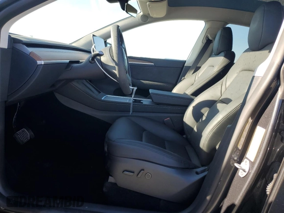 2024 Tesla Model Y with VIN 7SAYGDED4RF017614, listed as a Copart auction lot 88494625 with 11,209 mi miles and Salvage title. Bid and sale history available at DreamBid. Image 7.