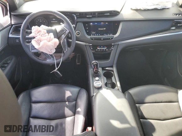 2021 Cadillac XT5 AWD Sport with VIN 1GYKNGRS1MZ229225, listed as a Copart auction lot 88223635 with 80,134 mi miles and Salvage title. Bid and sale history available at DreamBid. Image 8.