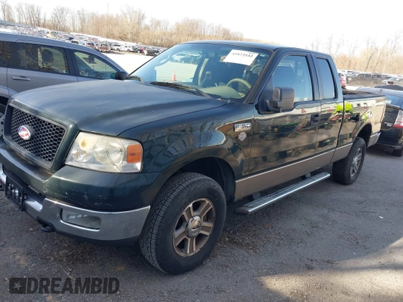 2005 Ford F-150 XLT with VIN 1FTPX14505FB72622, listed as a IAAI auction lot 41823532 with 165,918 mi miles. Bid and sale history available at carsss.com. Image 2.