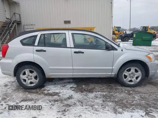 2007 Dodge Caliber SXT with VIN 1B3HB48B07D159549, listed as a IAAI auction lot 41330969 with 124,911 mi miles and . Bid and sale history available at DreamBid. Image 13.