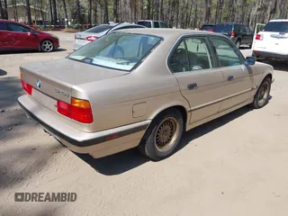 1995 BMW 5 Series 525i z VIN WBAHD6326SGK51720, wystawiony jako IAAI lot #41916040 z przebiegiem 232 337 mil mil oraz . Historia ofert i sprzedaży dostępna na DreamBid. Obrazek 4.